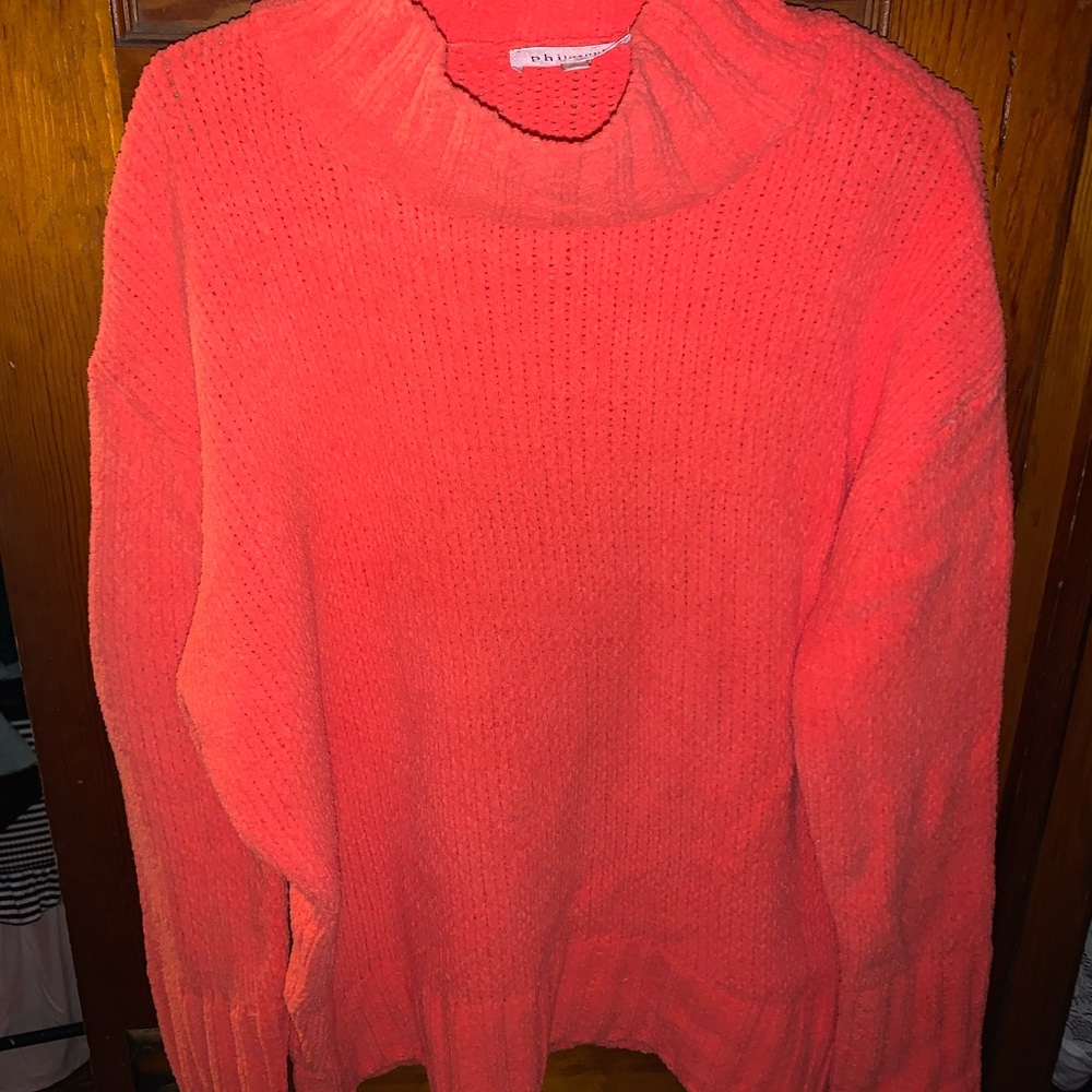 Bright orange mock neck sweater